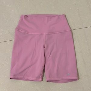 Alo yoga 7 inch biker shorts, sugar plum pink color.